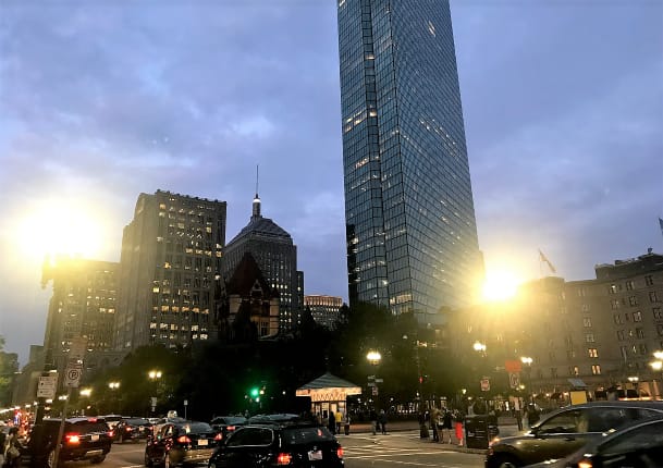 City life and the ocean. Boston by night.